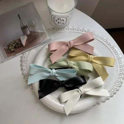 Sweet spring and summer pink color macaron leather bow hairpin duckbill clip ins wind girl side clip hairpin hair clips 